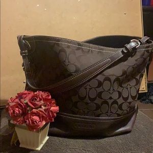 Beautiful COACH chocolate color purse with leather